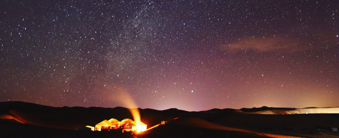 Bonfire Dining among Sand Dunes